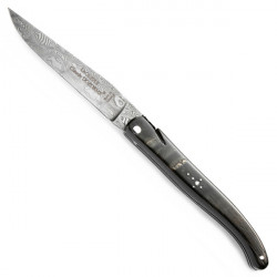 coltello Laguiole Damasco corno bufalo grezzo, struttura seghettata, cesellato.